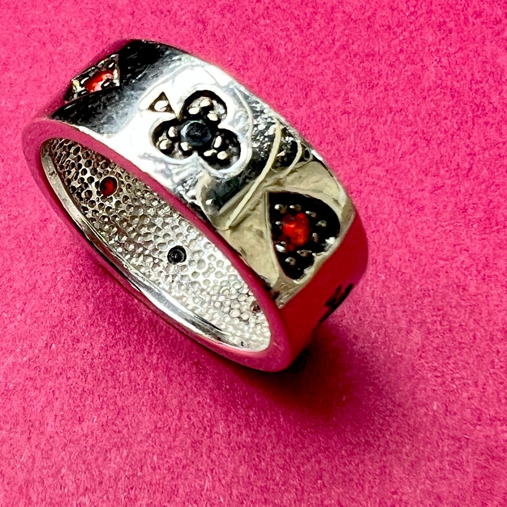 Playing card ring, solid 925 silver band w/ red and black gemstones all around.